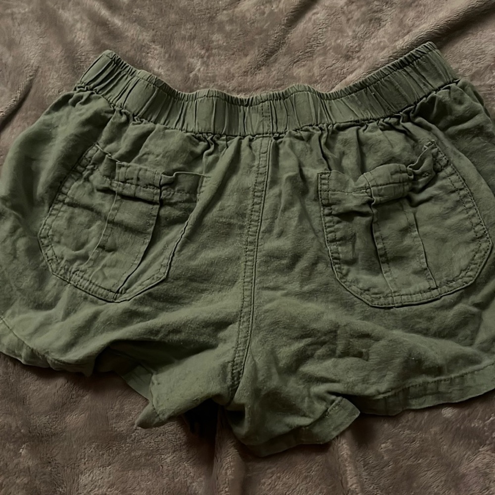 green shorts